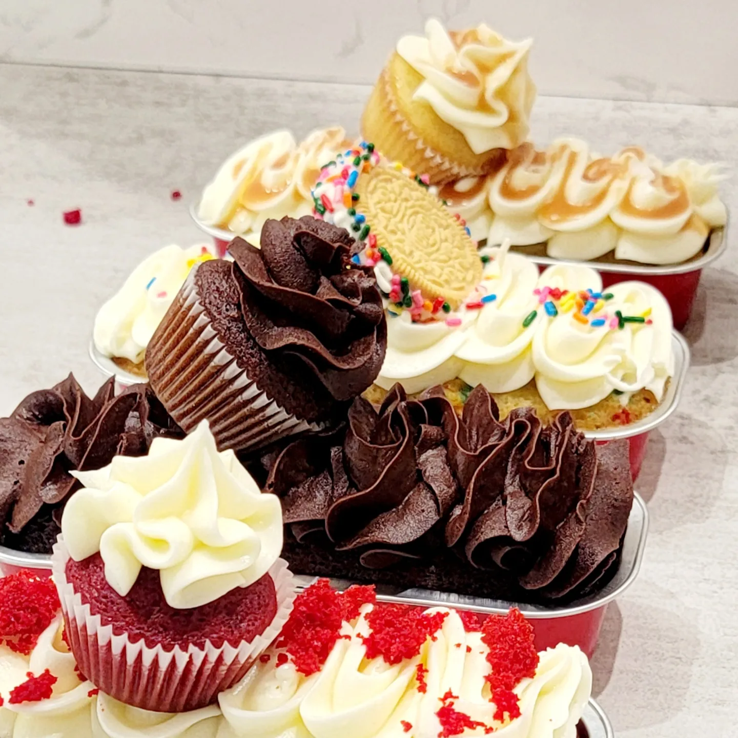 Photo shows beautiful cupcakes and desserts, baked from scratch.